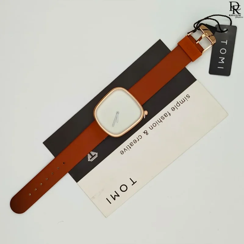 TOMI original unisex watch, TOMI watch price in Pakistan, leather strap TOMI watch, brass case unisex watch, trendy TOMI watch 2025, TOMI brand watch men women, affordable unisex wristwatch