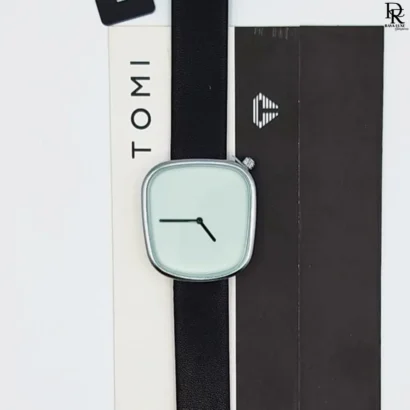 TOMI original unisex watch, TOMI watch price in Pakistan, leather strap TOMI watch, brass case unisex watch, trendy TOMI watch 2025, TOMI brand watch men women, affordable unisex wristwatch