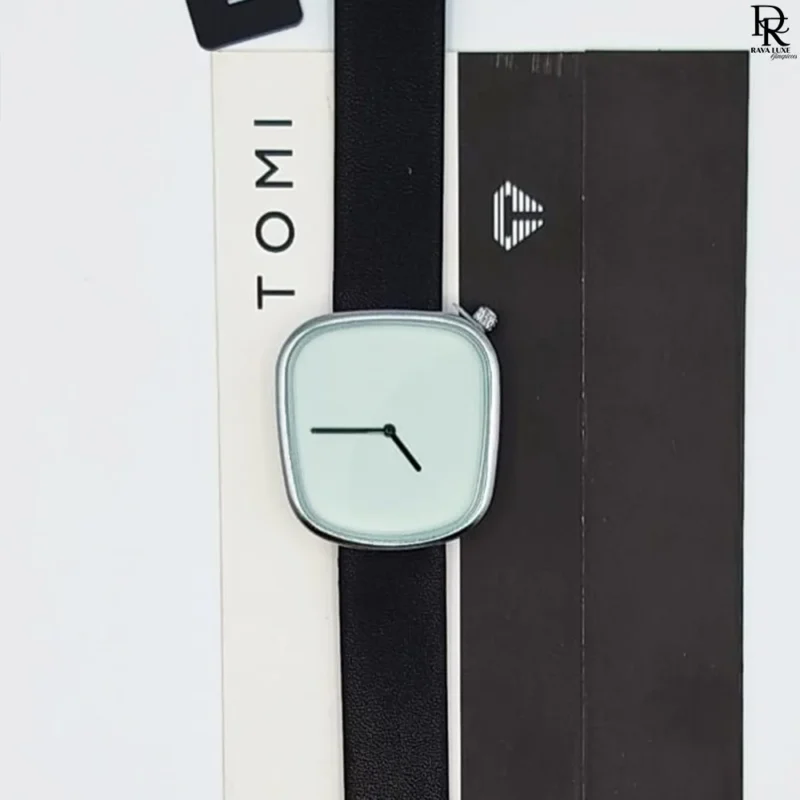 TOMI original unisex watch, TOMI watch price in Pakistan, leather strap TOMI watch, brass case unisex watch, trendy TOMI watch 2025, TOMI brand watch men women, affordable unisex wristwatch