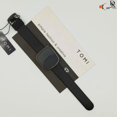 TOMI original unisex watch, TOMI watch price in Pakistan, leather strap TOMI watch, brass case unisex watch, trendy TOMI watch 2025, TOMI brand watch men women, affordable unisex wristwatch