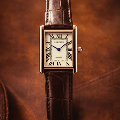 A Cartier Tank–style slim watch with leather strap and classic rectangular case — elegant design at an affordable price.