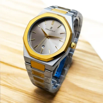 An Audemars Piguet–style men’s watch with stainless steel chain, butterfly lock, and working date — bold design at an affordable price.