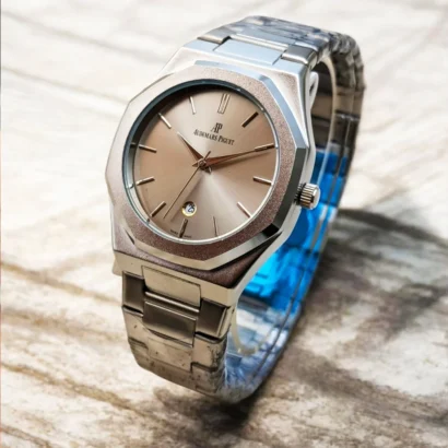 An Audemars Piguet–style men’s watch with stainless steel chain, butterfly lock, and working date — bold design at an affordable price.