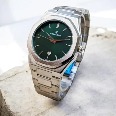 An Audemars Piguet–style men’s watch with stainless steel chain, butterfly lock, and working date — bold design at an affordable price.
