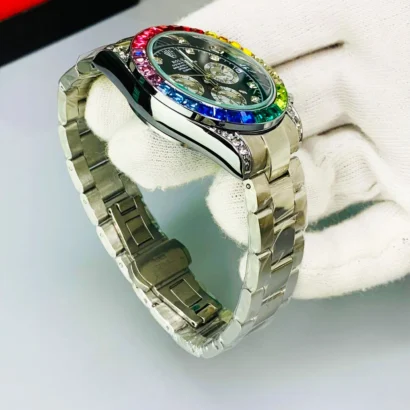A Rolex-style rainbow stone watch with working date, butterfly lock, and bold luxury look — made for shine, not Swiss horology.