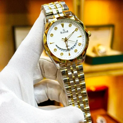 SEASTAR original men’s watch with quartz movement, date function, and metal strap with butterfly lock — clean luxury look with solid finishing.